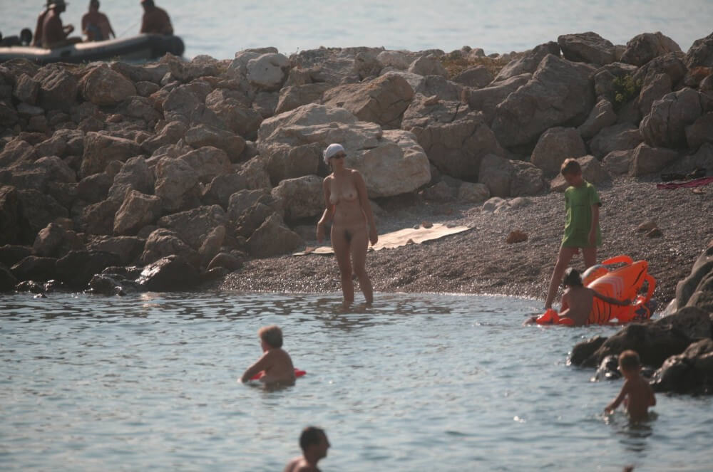 FKK cove pyramid in waters - Nudity as a natural aspect of human life