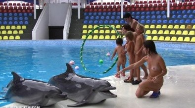 Dolphin Day Delights 1 - A defining feature of naturism is the absence of clothing
