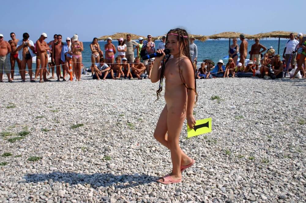 Naturist Mic Speech photos - Getting rid of swimsuits