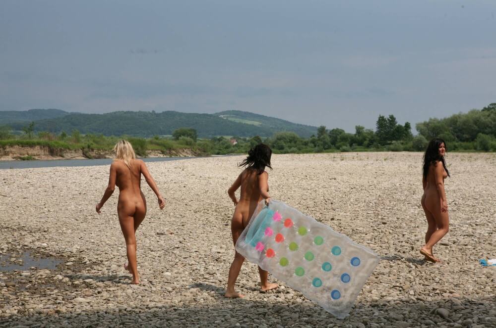 Naturist Park Floating On River photos - Nudism and naturism are a path to self-acceptance