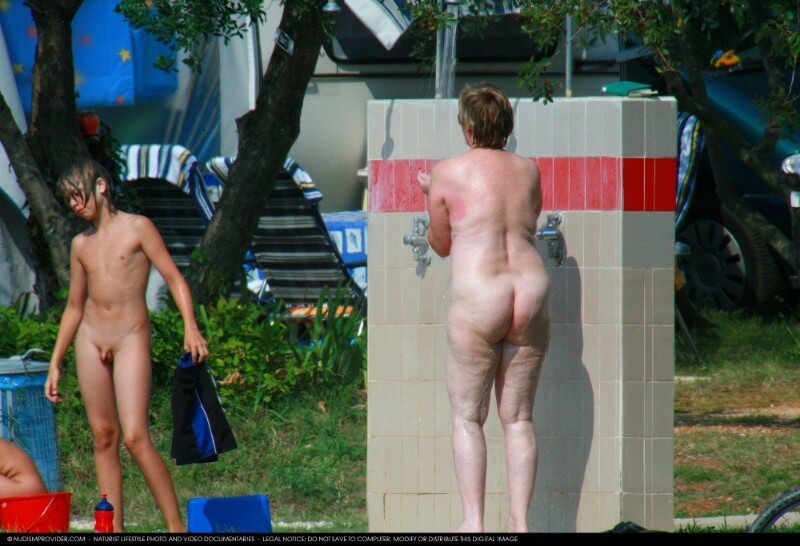 Covered in Towel Nudists-Boardwalk Biking - Naturism teaches respect for the body—both your own and others