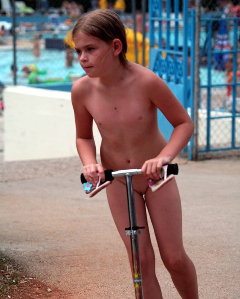 Pool-Side Naturist Scooter pics - Naturism promotes openness toward the body