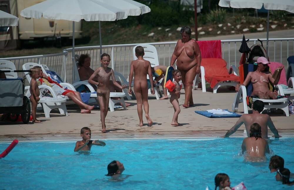 Naturist Afternoon Pool Games pics - Complete Natural Nudity