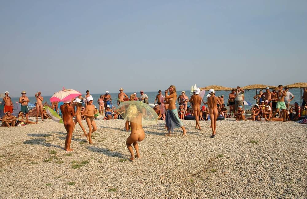 Ribbon and Umbrella Dance pics - Types of recreation in nudist and naturist resorts and parks