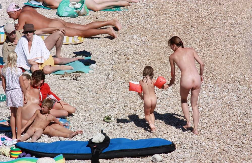 Orange Floaty Safety First Naturist pics - The nature of nudism provides strength and inspiration